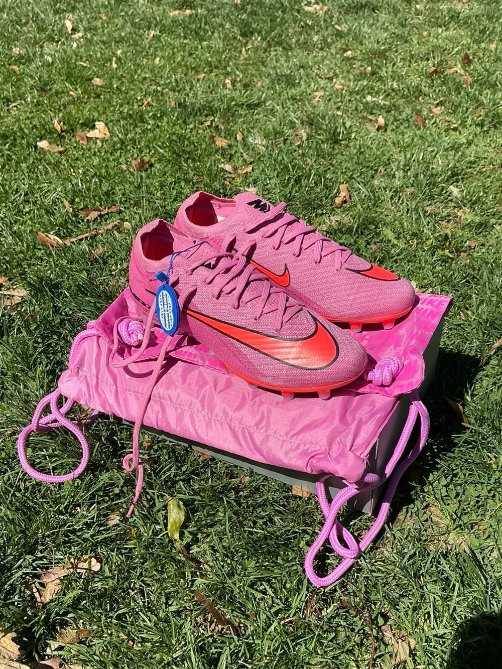 Kids Nike Purple and Orange Soccer Cleats with Orange Accents